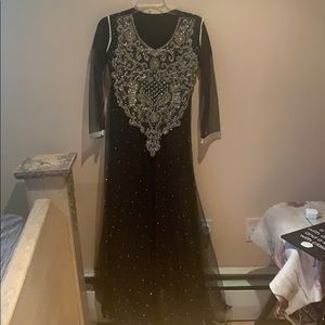 Black long kurti/no bottoms come with it.